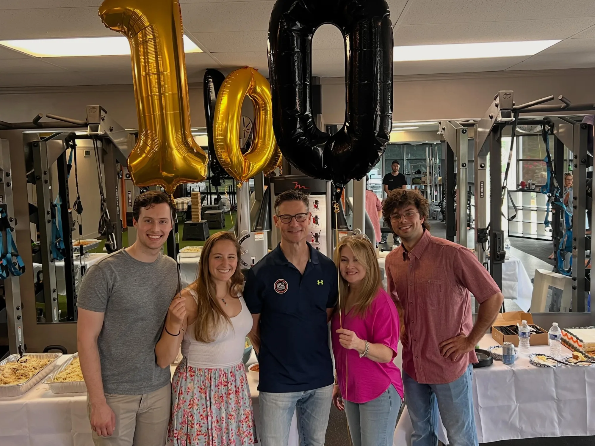Members and coaches celebrating 360's 10th anniversary